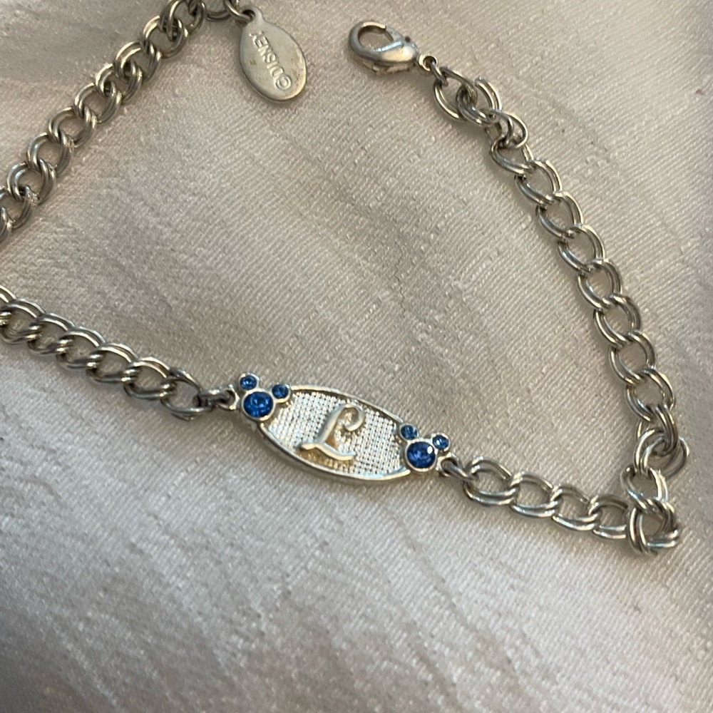 Clare’s Silver tone Initial “L” blue cut crystal accented chain bracelet